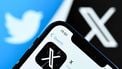 2023-11-17 11:51:58 A photo taken on November 17, 2023 shows the logo of US online social media and social networking service X - formerly Twitter - on a smartphone screen in Frankfurt am Main, western Germany.  
Kirill KUDRYAVTSEV / AFP