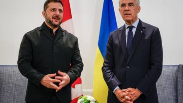 Canadian Prime Minister Mark Carney (R) listens to Ukrainian President Volodymyr Zelensky as they meet in Calgary, Alberta, on September 10, 2026. Canada is providing Ukraine additional support in air defense, Ukrainian President Volodymyr Zelensky said during a visit for talks with Prime Minister Mark Carney. Ukraine has stressed its urgent need for improved aerial defense in response to increased Russian ballistic missile strikes.
Jeff McIntosh / POOL / AFP