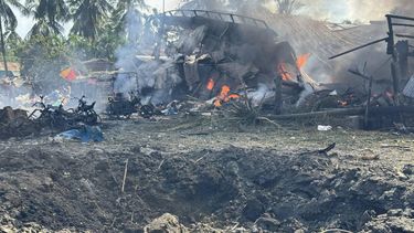 Smoke billows from fires in a residential area following a military airstrike on a market and adjacent bridge in Kyauktaw, Western Rakhine state on September 28, 2026. A military airstrike on a market in western Myanmar killed 33 people on September 28 and wounded 36 more, a rebel faction which controls the area said in a statement.
AFP
