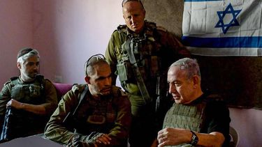 2023-11-26 16:43:32 In this handout picture taken and released by the Israeli Prime Minister's Office on November 26, 2023 Israeli Prime Minister Benjamin Netanyahu (R) meets soldiers at an undisclosed location in the Gaza Strip. Netanyahu told soldiers in the Gaza Strip on November 26 that Israel's efforts would continue 