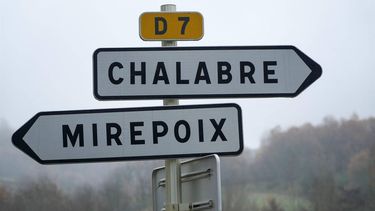 This video grab from an AFPTV video taken and released on December 15, 2023 shows road sign directions to 