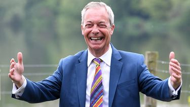 Reform UK leader Nigel Farage reacts during a visit to St Helens, north west England on May 8, 2026, as votes continue to be counted following local elections. Nigel Farage, leader of the Britain's hard-right nationalist Reform UK party, vowed Friday it was 
