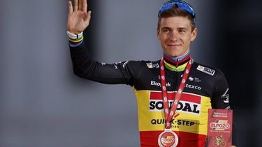 Team Quick Step's Belgian rider Remco Evenepoel celebrates on the podium after winning the 