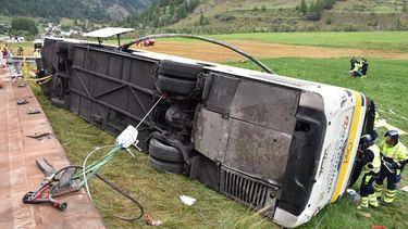 This handout photograph released on September 11, 2026 by the Swiss Police of Canton Graubunden shows the wreckage of a bus with Dutch passengers after an accident in between the village of Susch and Zernez, eastern Switzerland, on September 10, 2026. Five people were killed and three others seriously injured on September 10, 2026 in an accident involving a bus carrying 45 Dutch tourists in eastern Switzerland, local police reported on September 11, 2026.
Handout / KANTONPOLIZEI GRAUBUNDEN / AFP