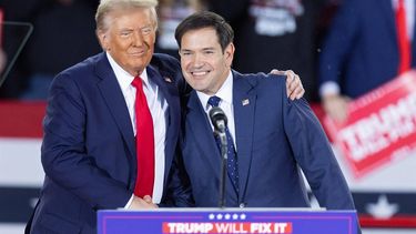 Former US President and Republican presidential candidate Donald Trump greets Senator Marco Rubio, Republican of Florida, during a campaign rally at the J.S. Dorton Arena in Raleigh, North Carolina, on November 4, 2024.  Bitter rivals Kamala Harris and Donald Trump embark on a final frenzied campaign blitz Monday with both hitting must-win Pennsylvania on the last day of a tight and volatile US presidential election campaign.
Ryan M. Kelly / AFP