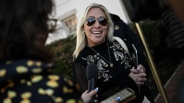 US Representative Marjorie Taylor Greene, Republican from Georgia, speaks to reporters as she arrives for a closed-door meeting with House Republicans, at the Republican National Committee office on Capitol Hill on March 25, 2025, in Washington, DC.  
Drew ANGERER / AFP