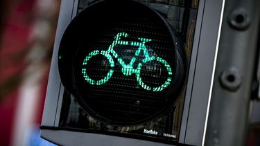 Groen licht via telefoon van fietser en automobilist