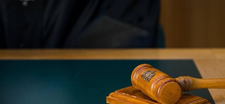 ILLUSTRATIE - Een rechter met wetboek in de rechtzaal. ANP  ROOS KOOLE