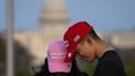 epaselect epa11706457 People wearing Make America Great Again hats on the National Mall are seen with the US Capitol Building in the background at dusk, in Washington, DC, USA, 06 November 2024. Republican presidential candidate Donald J. Trump was declared the winner of the 2024 US presidential election over Democratic presidential candidate US Vice President Kamala Harris.  EPA/GRAEME SLOAN