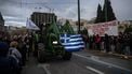 Greek farmers take part with their tractors in a protest over long delays in subsidy payments, low prices, rising energy costs and worsening climate conditions, outside the parliament in Athens on February 13, 2026. 
Angelos TZORTZINIS / AFP